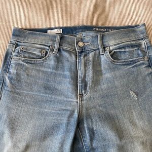 Skinny distressed light blue denim